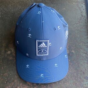 adidas TP Golf Print Navy SnapBack Hat with All-Over Palm Tree Print. GJ7035